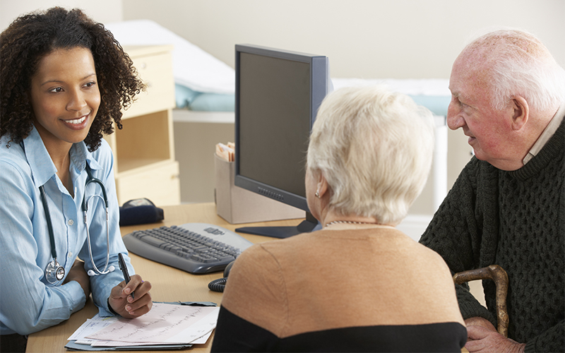 student talking to retired couple