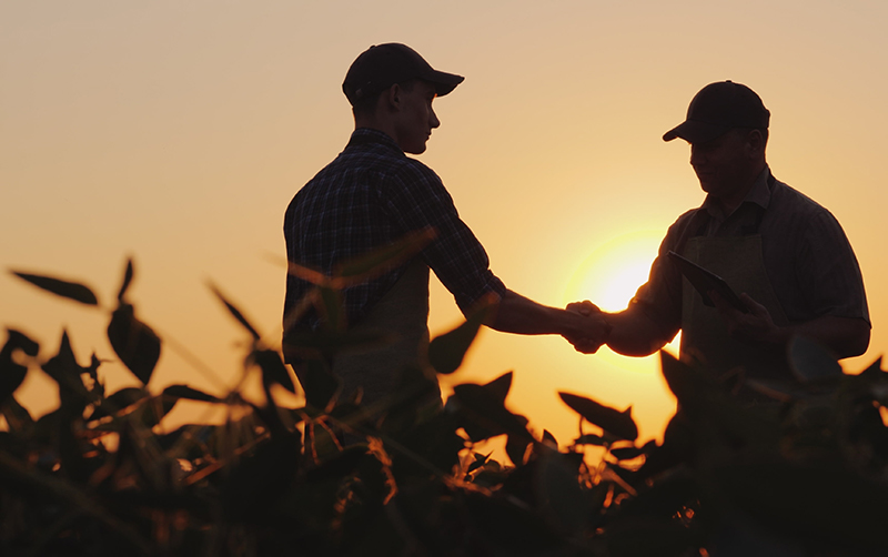 agribusiness student interacting with the farmer