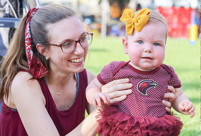 image of tailgater with child