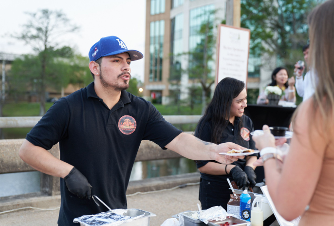 vendor serving at wine over water