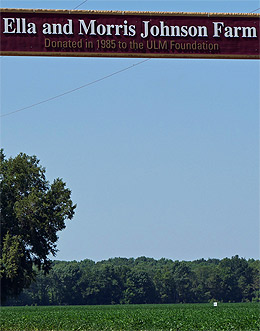 Ella and Morris Johnson Farm sign photo of sign over road