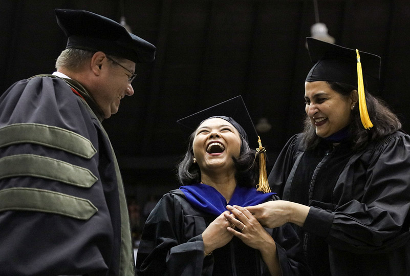 photo of student receiving diploma