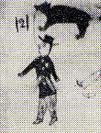 1905--Man in police uniform with black bear name symbol