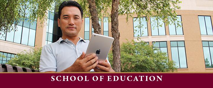 photo of education professor on tablet for education