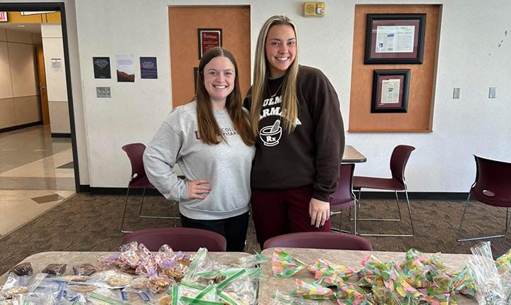 APhA students host a bake sale at the College of Pharmacy to raise money for their Women’s Health Initiative.