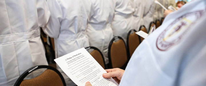 photo of nursing student reading pledge