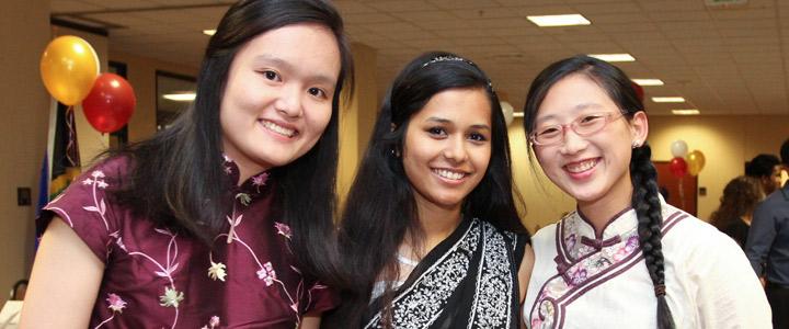 photo of three students smiling