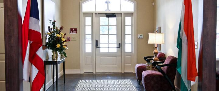 photo of entry way with flags