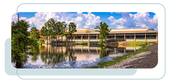 Bayou Pointe University of Louisiana Monroe Bayou Pointe Building view from the bayou