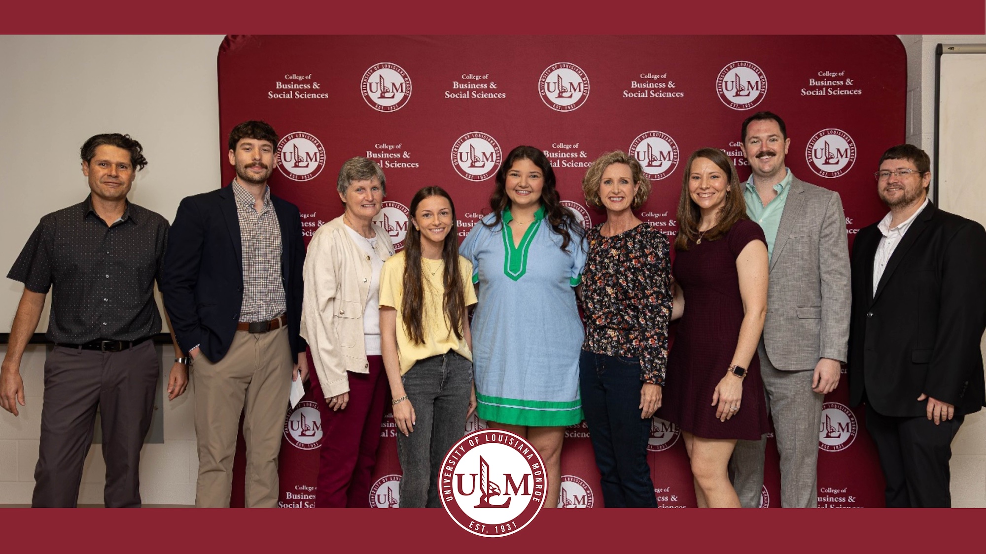 ULM accounting students pose with faculty and administrators after winning prestigious scholarships