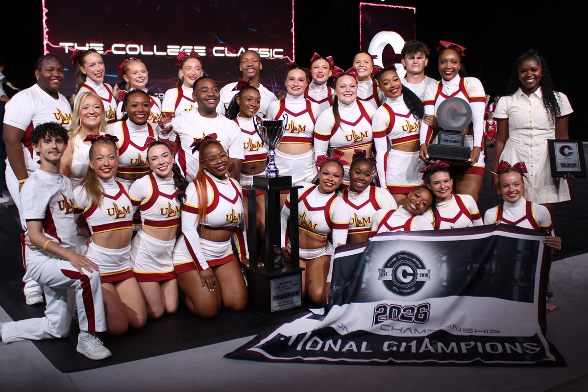 Members of the ULM Cheerleading team pose after winning the national championship in Orlando, Florida. 