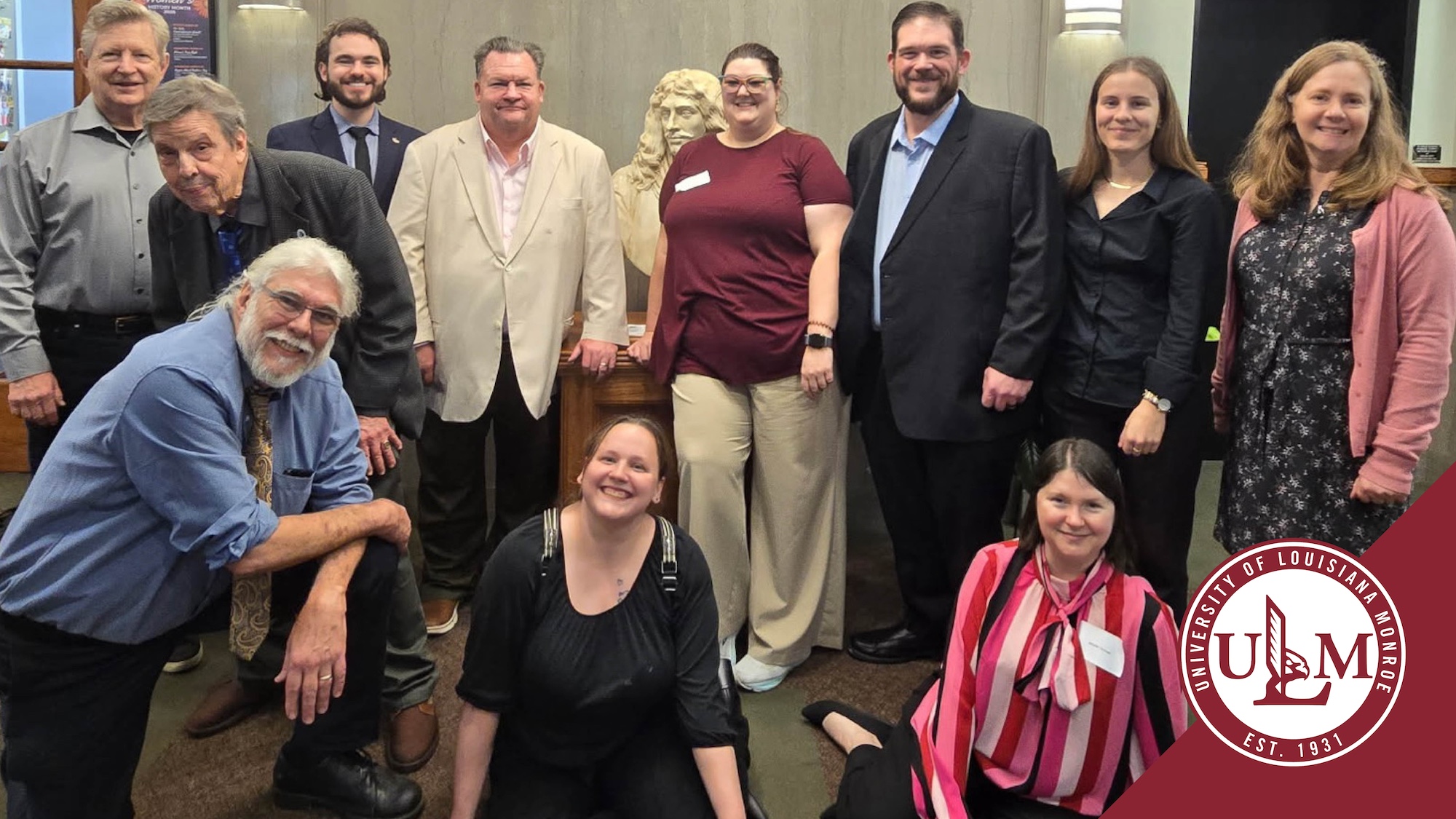 A group of ULM Political Science faculty and students pose at an annual state meeting.