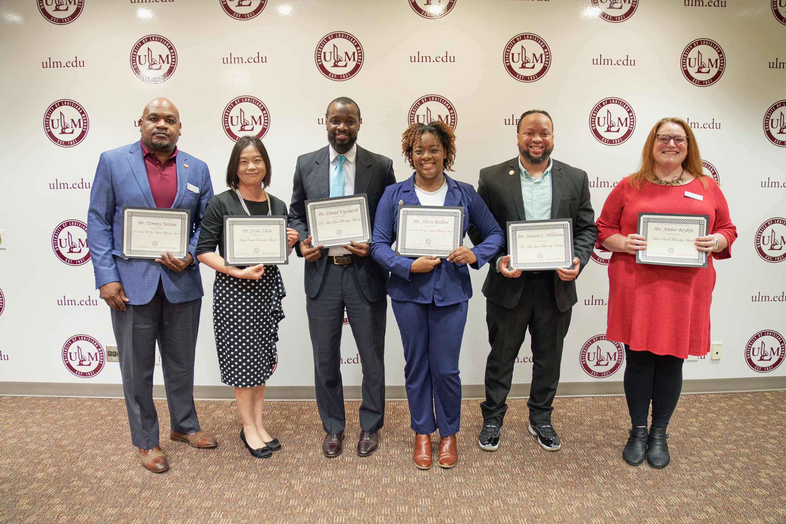 The recipients for the Dr. Alex John, Dr. Sarah McCoy, and Alma Sewell Fellowships pose for a group photo.