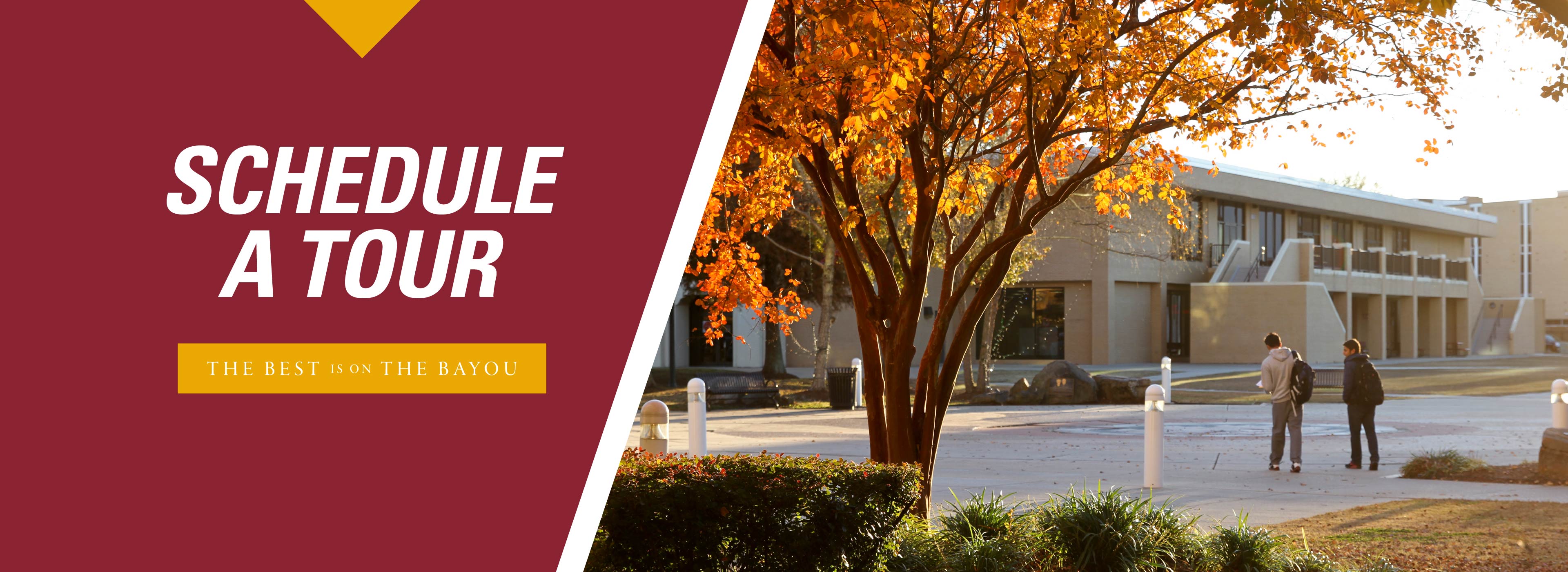 #slide3 Schedule a Tour, Image of two students walking across campus on a fall day