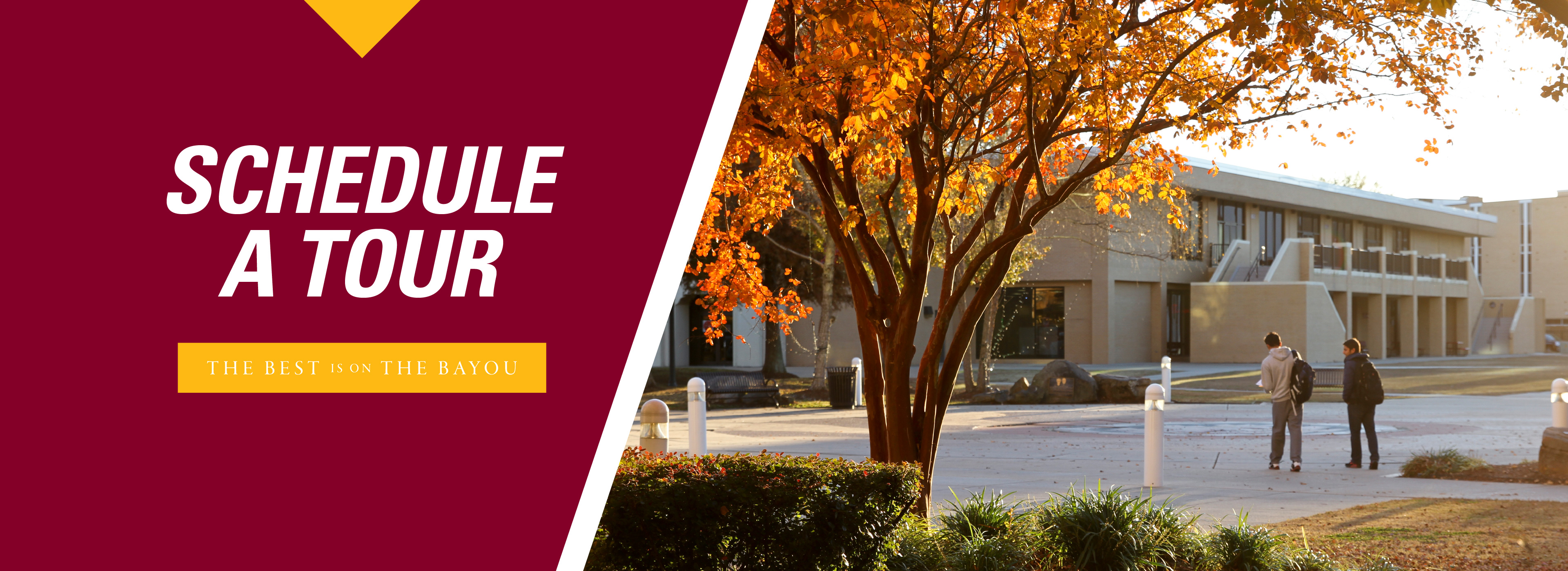 Schedule a Tour, Image of two students walking across campus on a fall day