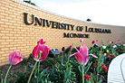 entrance sign with flowers